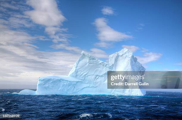 lone iceberg just off coast of south georgia - iceberg stockfoto's en -beelden