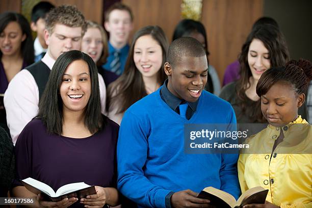 singing hymns - choir stock pictures, royalty-free photos & images