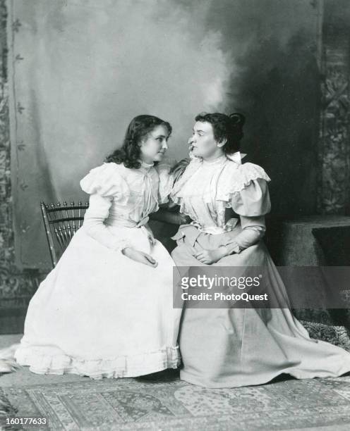 Deaf and blind student Helen Keller 'listens' to her teacher, Anne Sullivan, 1897.