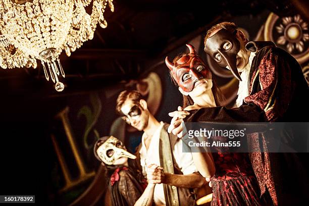 couples at the masquerade ball - stage costume stock pictures, royalty-free photos & images