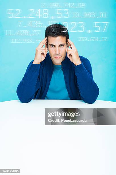 casual man concentrated in calculations - hypnotist stock pictures, royalty-free photos & images