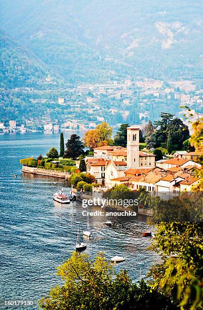 view on torno village, lake como, italy - como italy stock pictures, royalty-free photos & images