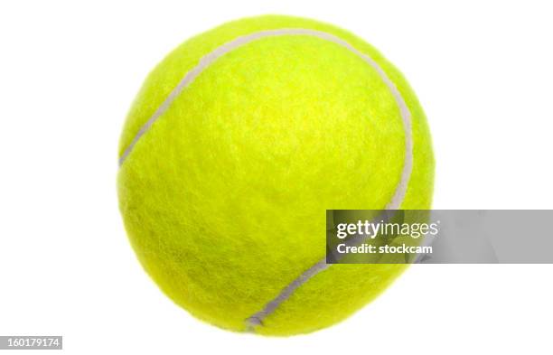 isolated yellow tennis ball on white - cut out stockfoto's en -beelden