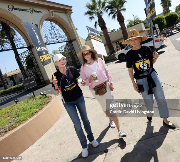 Nana Visitor, Michelle Forbes and Tara Buck walk the picket line at Paramount Studios on August 08, 2023 in Los Angeles, California. Members of...