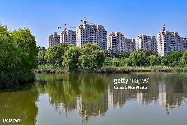 Real estate complex under construction in Qingzhou city, East China's Shandong province, Aug 15, 2023. On August 15, the National Bureau of...
