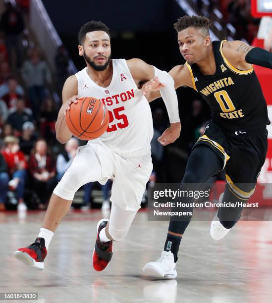 Houston Cougars guard Galen Robinson Jr. Battles against Wichita State Shockers guard Dexter Dennis during the second half of an NCAA Men's...