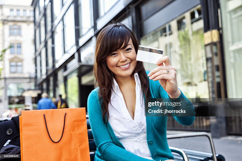 Happy Young Asian Woman with Credit Card