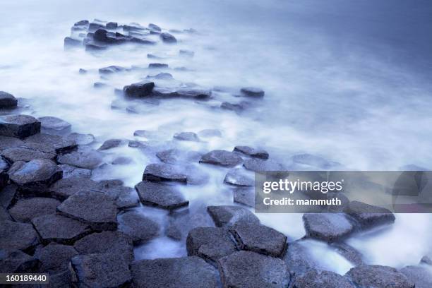 giant's causeway long exposure shot - basalt stock pictures, royalty-free photos & images