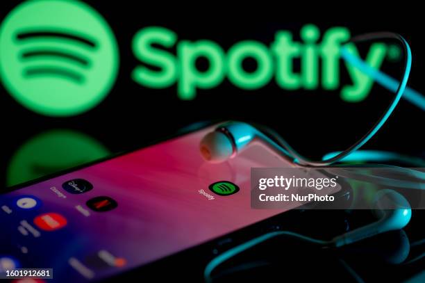 Spotify logo displayed on a smart phone with Spotify seen on screen, in this photo illustration, on 15 August 2023 Brussels, Belgium.