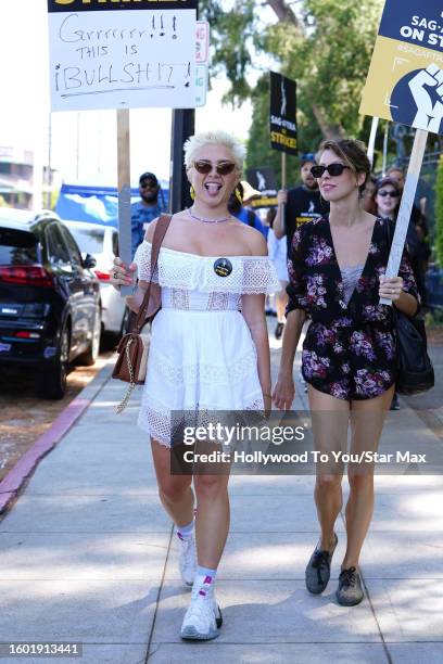 Florence Pugh walks the picket line in support of the SAG-AFTRA and WGA strike at Disney Studios on August 15, 2023 in Burbank, California.