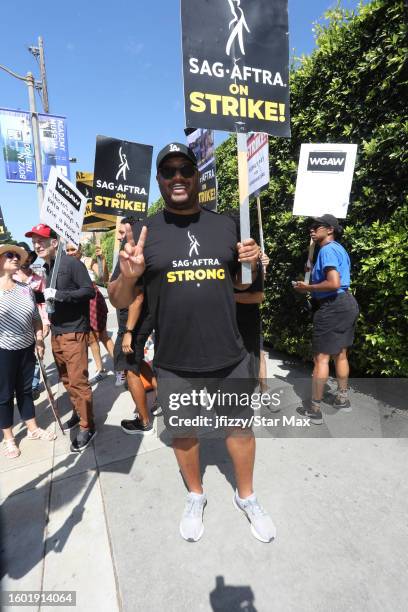 Cedric Yarbrough walks the picket line in support of the SAG-AFTRA and WGA strike at Paramount Studios on August 15, 2023 in Hollywood, California.