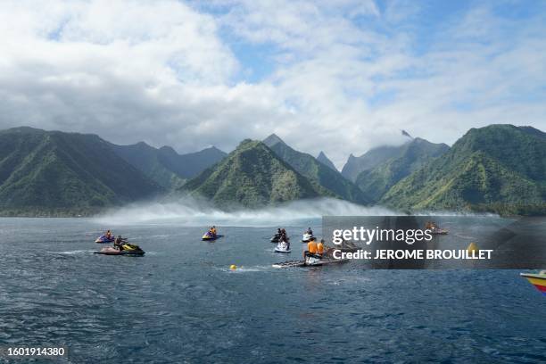 Jet ski rescue teams watch the WSL Shiseido Tahiti pro surfing event from boats at Teahupo'o in Tahiti, French Polynesia, on August 15, 2023....