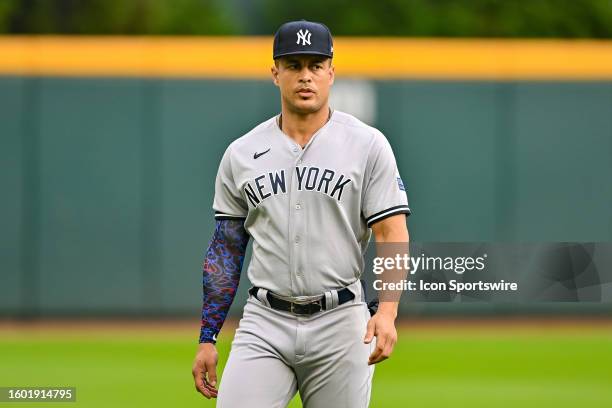 New York Yankees' Giancarlo Stanton warms up before a baseball