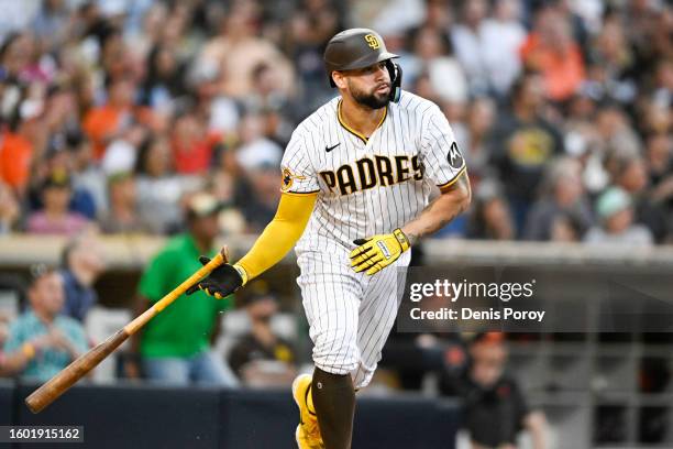 Gary Sanchez of the San Diego Padres hits a grand slam home run during the first inning of a baseball game against the Baltimore Orioles on August...