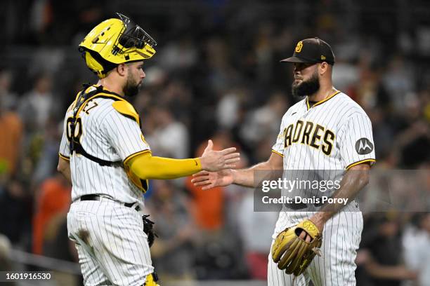 Luis Garcia of the San Diego Padres is congratulated by Gary Sanchez after the Padres beat the Baltimore Orioles 10-3 in a baseball game on August...