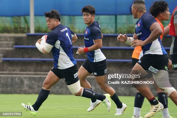 Japan's hooker Atsushi Sakate and teammates take part in a training session in Tokyo on August 16 a day after the selection announcement of Japan's...