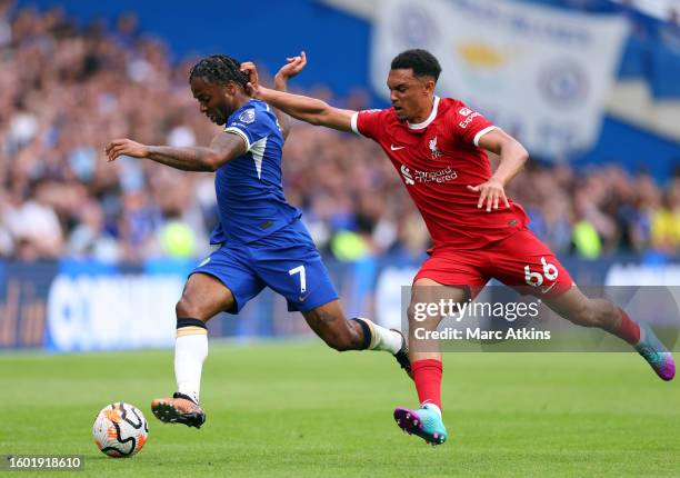 Raheem Sterling of Chelsea in action with Trent Alexander-Arnold of Liverpool during the Premier League match between Chelsea FC and Liverpool FC at...