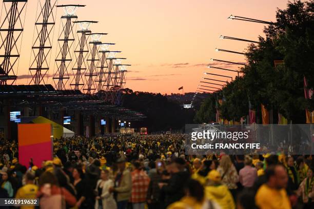 Spectators crowd to enter the Stadium Australia ahead of the Australia and New Zealand 2023 Women's World Cup semi-final football match between...