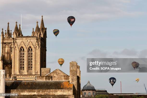 Hot air balloons seen floating over the city during the balloon festival. Bristol International Balloon Fiesta is Europe's largest hot air balloon...