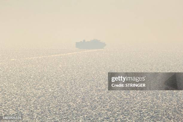 The first cargo ship using new Black Sea shipping lanes is seen leaving the southern port of Odesa on August 16, 2023. Ukraine on August 16, 2023...