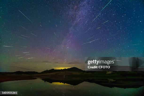 The Perseid meteor shower is seen over the Ulanbum grassland in Chifeng city, Inner Mongolia, China, August 14, 2023.