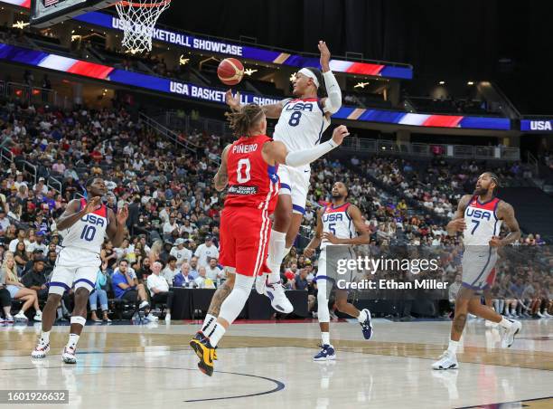 Paolo Banchero of the United States passes to Anthony Edwards against Isaiah Pineiro of Puerto Rico in the second half of a 2023 FIBA World Cup...