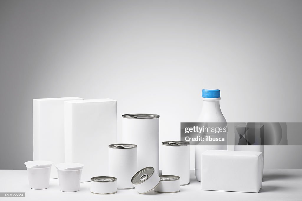 Blank labeled products on neutral white to gray gradient background