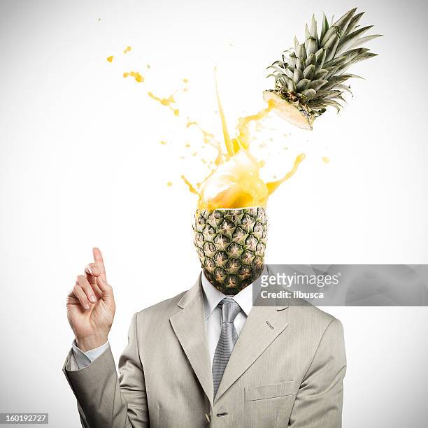 hombre de negocios teniendo una piña cabeza explosivo idea - man splashed with colour fotografías e imágenes de stock