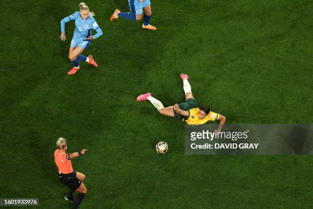 Australia's forward Sam Kerr gestures to referee Tori Penso after a tackle by England's defender Alex Greenwood during the Australia and New Zealand...