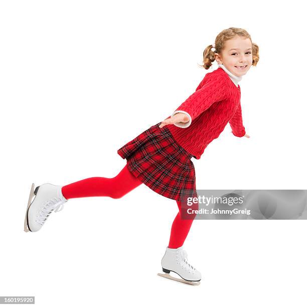 happy girl ice-skating - arabesque position stock pictures, royalty-free photos & images