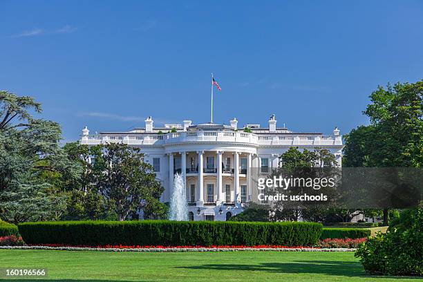 white house in clear sky - weißes haus stock-fotos und bilder