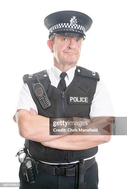 english policeman - police hat stock pictures, royalty-free photos & images