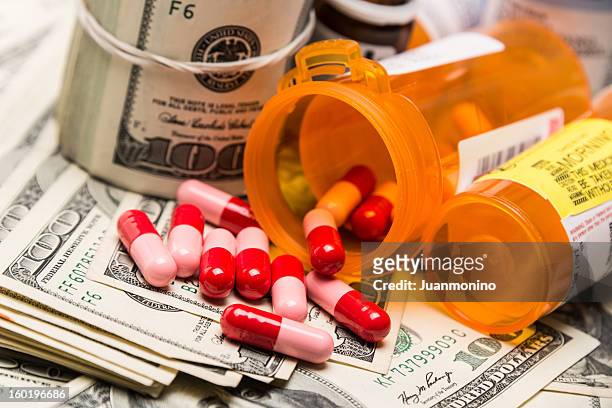 expensive healthcare - prescription drug costs stock pictures, royalty-free photos & images
