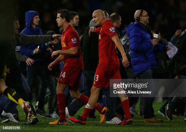 Jordan Henderson and Jonjo Shelvey of Liverpool walk off the pitch at the end of during the FA Cup with Budweiser Fourth Round match between Oldham...