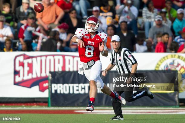 Quarterback Tyler Wilson of the South Team throws a pass during the game against the North Team on January 26, 2013 at Ladd-Peebles Stadium in...