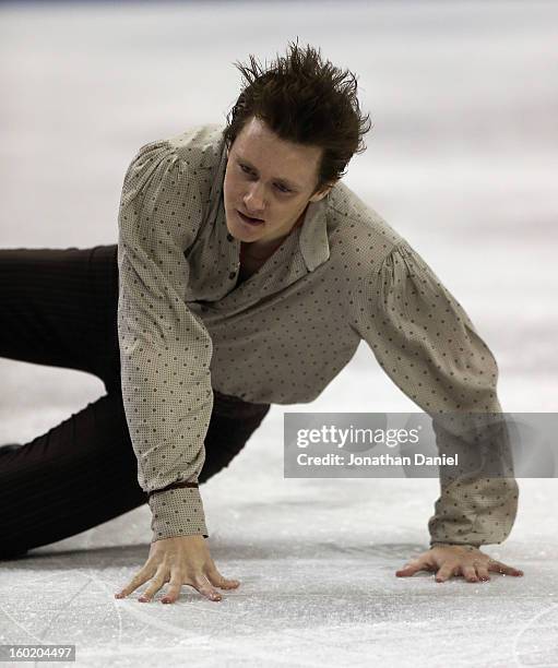 Jeremy Abbott falls to the ice while competing in the Mens Free Skate during the 2013 Prudential U.S. Figure Skating Championships at CenturyLink...