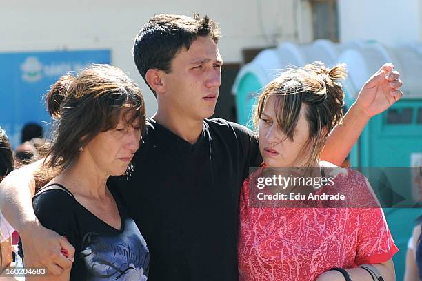 Friends and families after last night fire in Santa Maria on January 27, 2013 in Santa Maria, Brazil. Last night the nightclub Kiss caught fire...