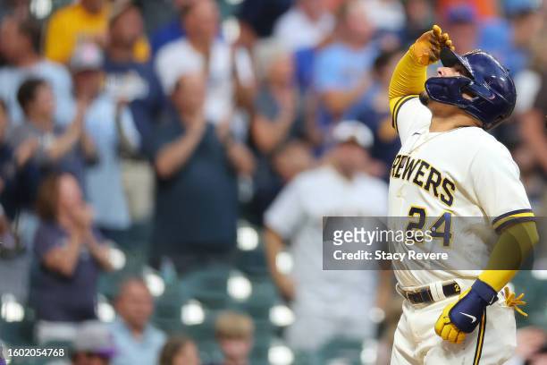 William Contreras of the Milwaukee Brewers celebrates a home run against the Colorado Rockies during the fourth inning at American Family Field on...