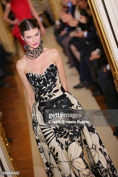 Model walks the runway during Curiel Couture fashion show as part of AltaRoma AltaModa Fashion Week on January 27, 2013 in Rome, Italy.