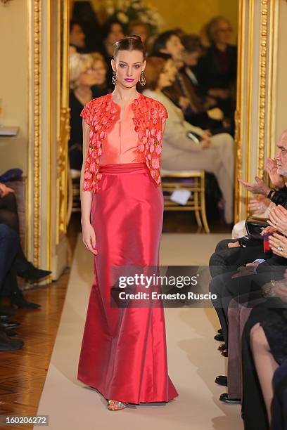 Model walks the runway during Curiel Couture fashion show as part of AltaRoma AltaModa Fashion Week on January 27, 2013 in Rome, Italy.