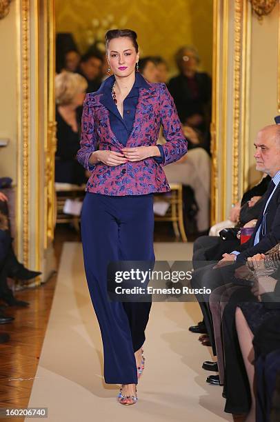 Model walks the runway during Curiel Couture fashion show as part of AltaRoma AltaModa Fashion Week on January 27, 2013 in Rome, Italy.