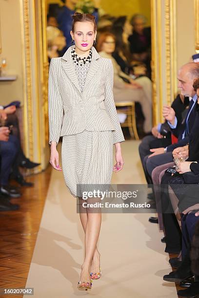 Model walks the runway during Curiel Couture fashion show as part of AltaRoma AltaModa Fashion Week on January 27, 2013 in Rome, Italy.