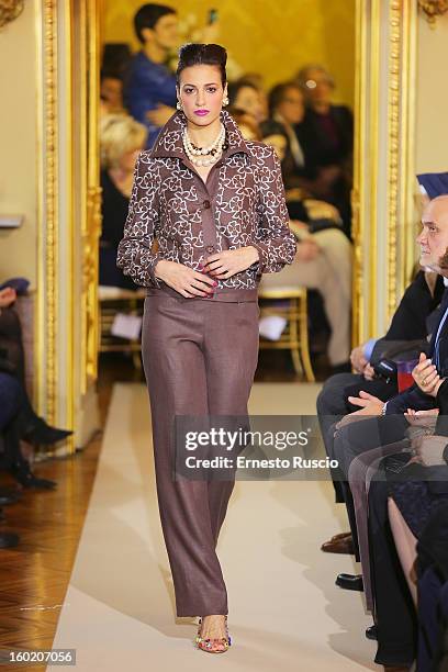 Model walks the runway during Curiel Couture fashion show as part of AltaRoma AltaModa Fashion Week on January 27, 2013 in Rome, Italy.