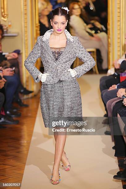 Model walks the runway during Curiel Couture fashion show as part of AltaRoma AltaModa Fashion Week on January 27, 2013 in Rome, Italy.