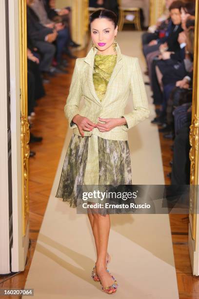 Model walks the runway during Curiel Couture fashion show as part of AltaRoma AltaModa Fashion Week on January 27, 2013 in Rome, Italy.