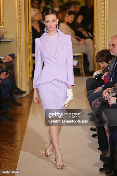 Model walks the runway during Curiel Couture fashion show as part of AltaRoma AltaModa Fashion Week on January 27, 2013 in Rome, Italy.