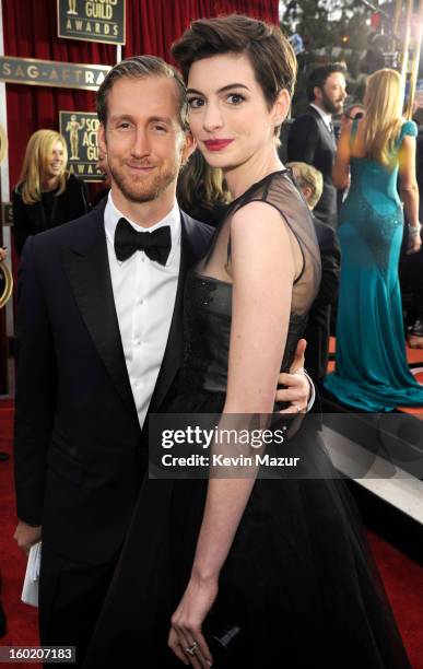 Adam Shulman and Anne Hathaway attend the 19th Annual Screen Actors Guild Awards at The Shrine Auditorium on January 27, 2013 in Los Angeles,...