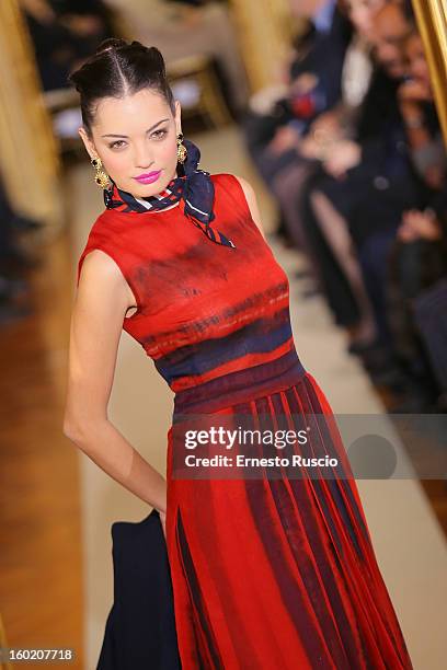 Model walks the runway during Curiel Couture fashion show as part of AltaRoma AltaModa Fashion Week on January 27, 2013 in Rome, Italy.