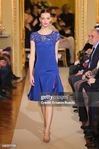 Model walks the runway during Curiel Couture fashion show as part of AltaRoma AltaModa Fashion Week on January 27, 2013 in Rome, Italy.