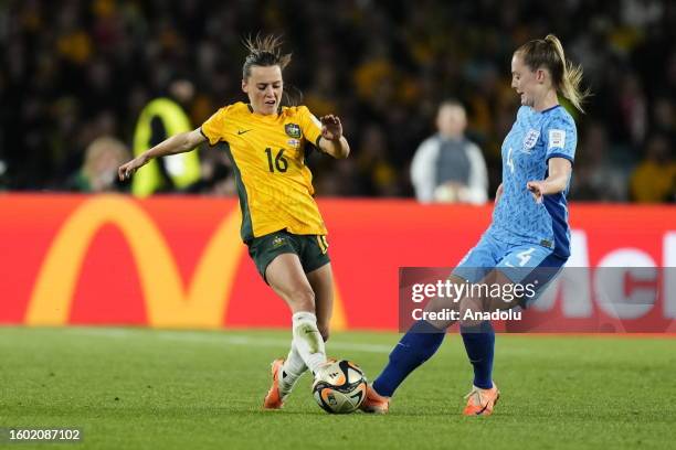 Hayley Raso of Australia and Keira Walsh of England compete during the FIFA Women's World Cup 2023 Semi-Final match between Australia and England at...